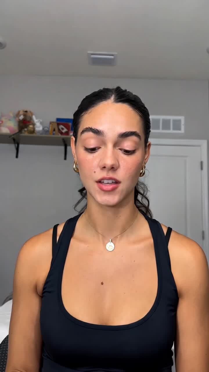 A creator in a home interior facing the camera